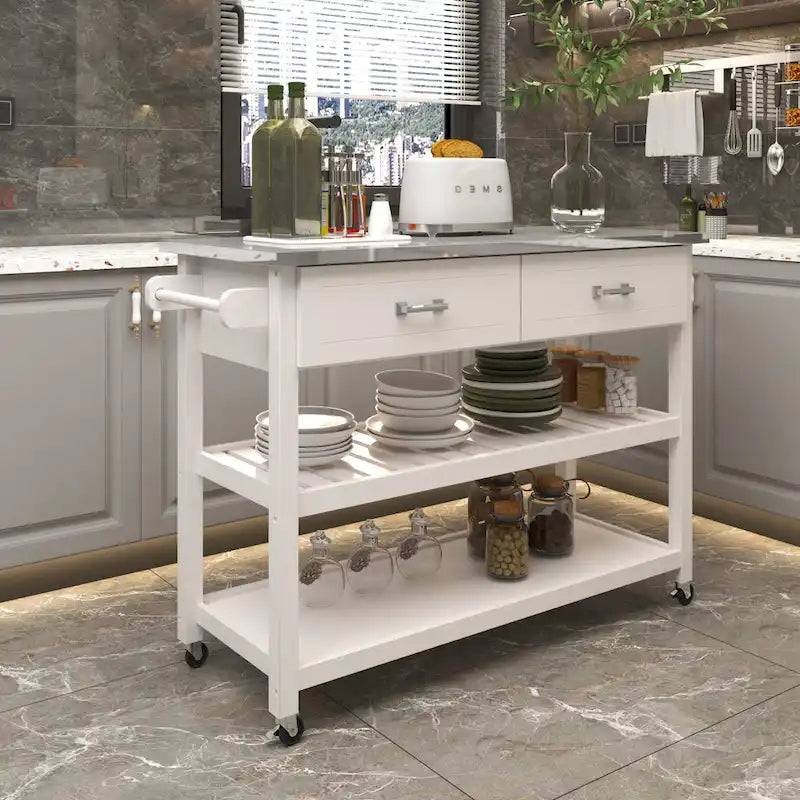 Chariot de cuisine blanc avec plateau en acier inoxydable, deux tiroirs et étagères ouvertes sur roulettes
