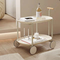 Chariot de service roulant à 2 niveaux en métal avec poignée en bois, plateaux ovales et 4 roulettes crème
